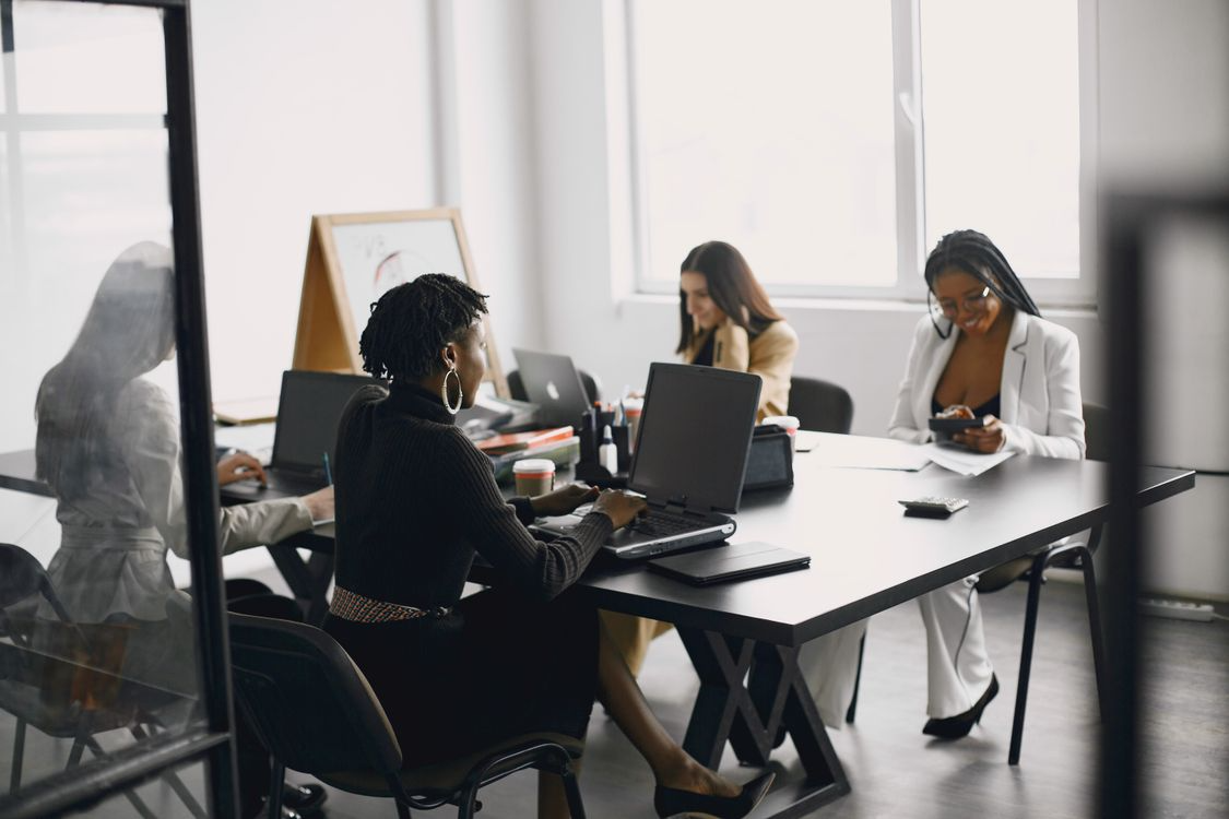 Professionals working together around a meeting table