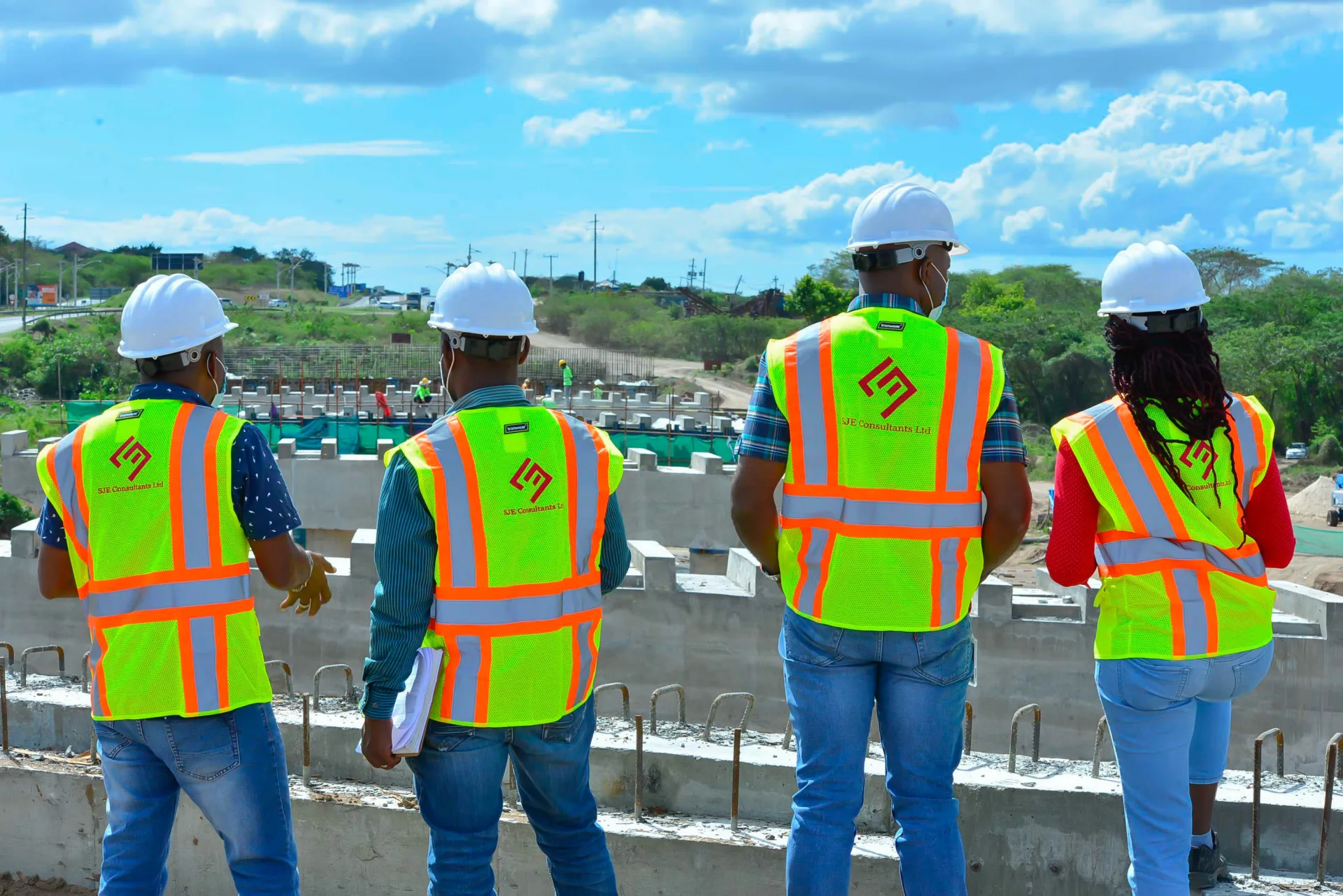 SJE team overlooking an active construction site
